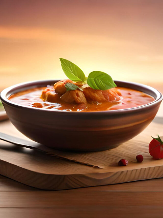 bowl-tomato-soup-with-spoon-wooden-table